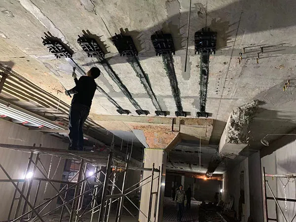 Pre-Tensioned Carbon Fiber Plate Strengthening for Supermarket in Anhui, China