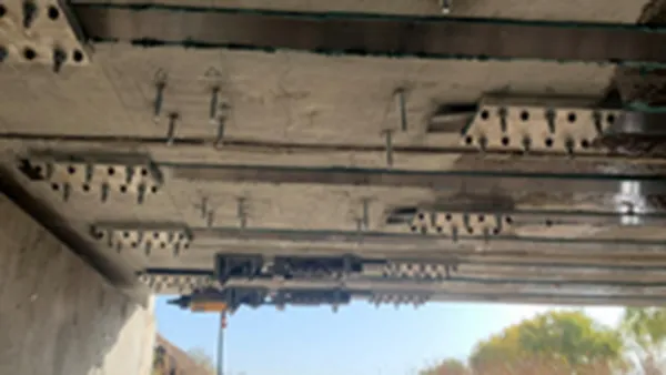 Road & bridge prestressed CFRP plate reinforcement